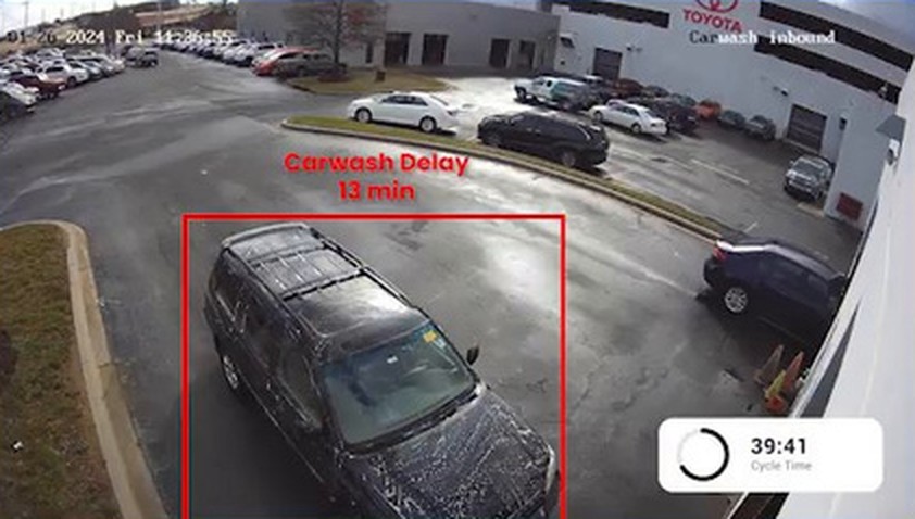 Car wash area camera view detecting a wash delay