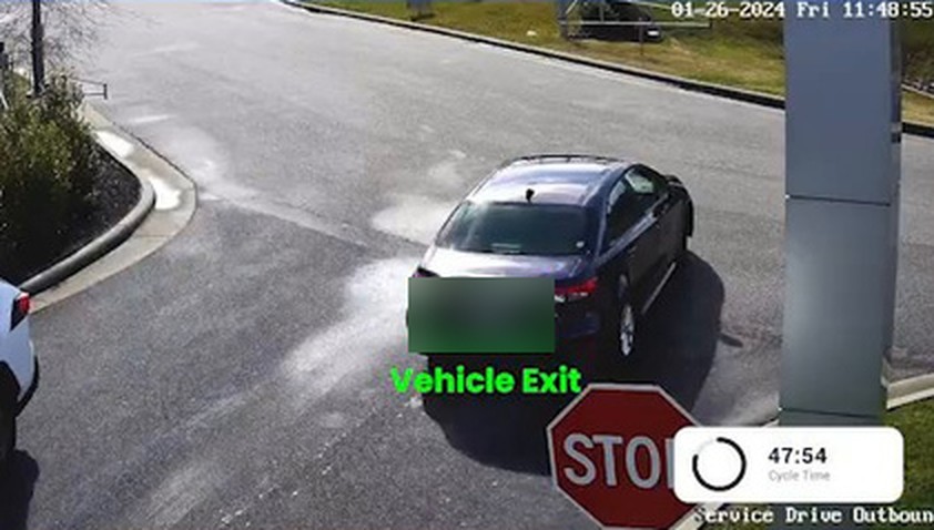 Service drive outbound camera confirming vehicle exit and total cycle time